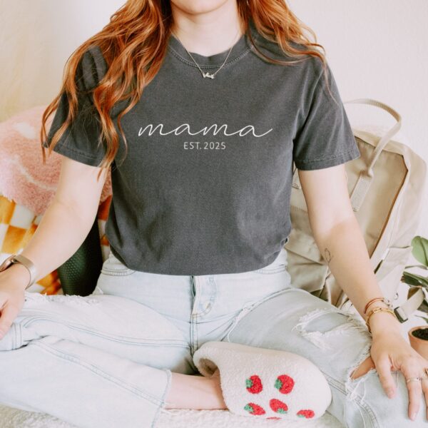 Pepper Comfort Colors Embroidered Mama T-Shirt with white embroidery 'mama EST. 2025', flat lay.