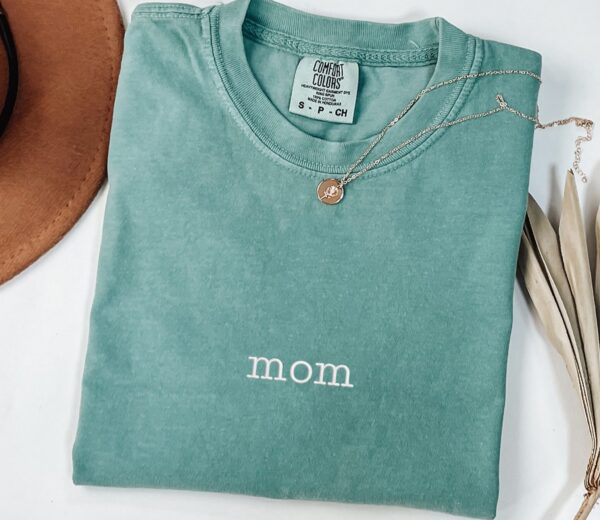 Seafoam Comfort Colors Mom Shirt with white embroidered “mom”, casual cotton tee for moms.