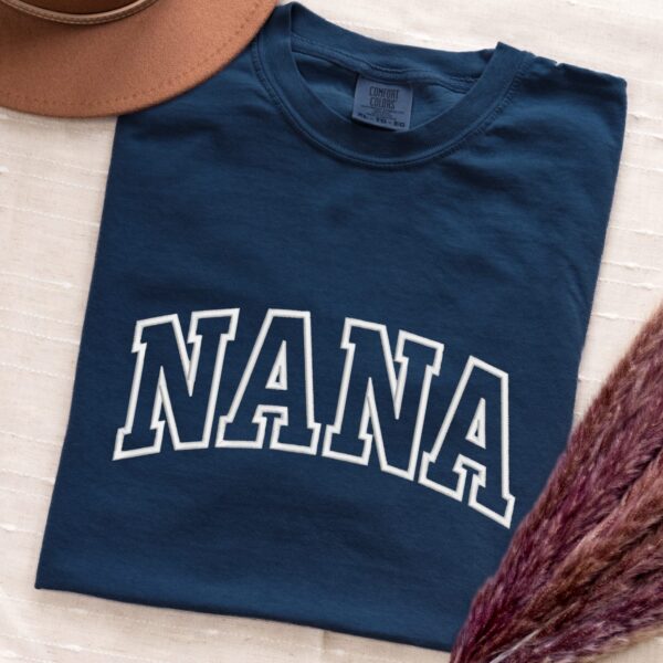 Comfort Colors Navy Blue Nana T-Shirt with white varsity embroidery.