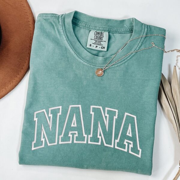 Comfort Colors Seafoam embroidered Nana T-Shirt with bold white embroidered text.