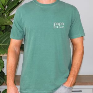 Seafoam green Comfort Colors Papa Shirt worn by man, white “papa EST. 2025” embroidery, casual fit.